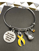 Yellow Ribbon Charm Bracelet - She Needed a Hero So That's What She Became - Rock Your Cause Jewelry
