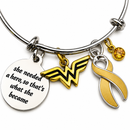 Gold Ribbon Bracelet - She Needed a Hero, So That's What She Became