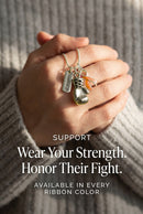 Periwinkle ribbon boxing glove and warrior necklace by Rock Your Cause Jewelry displayed on a white background.