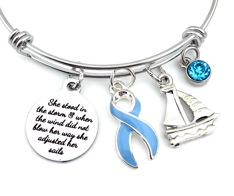 Light Blue Ribbon - She Stood in the Storm / Adjusted Her Sails Charm Bracelet