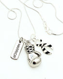 Zebra Ribbon Boxing Glove Necklace by Rock Your Cause Jewelry, featuring a detailed boxing glove pendant with zebra pattern on a chain
