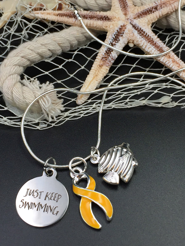Gold Ribbon Jewelry - Just Keep Swimming Necklace or Bracelet - Rock Your Cause Jewelry