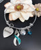 Teal & White Ribbon - Cervical Cancer Survivor Charm Bracelet - Rock Your Cause Jewelry