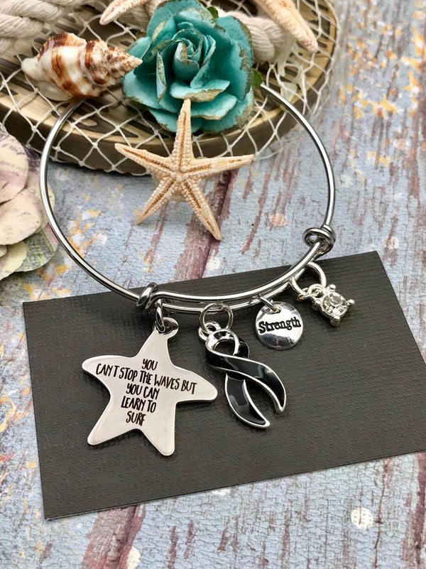 Black Ribbon Charm Braclet - You Can't Stop the Waves, But You Can Learn to Surf - Rock Your Cause Jewelry