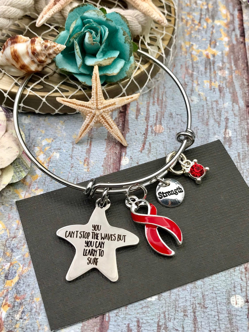 Red Ribbon Charm Bracelet - You Can't Stop Waves But You Can Learn To Surf - Rock Your Cause Jewelry