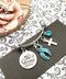 Light Blue Ribbon - She is Strong / Proverbs 34:25 Charm Bracelet - Rock Your Cause Jewelry