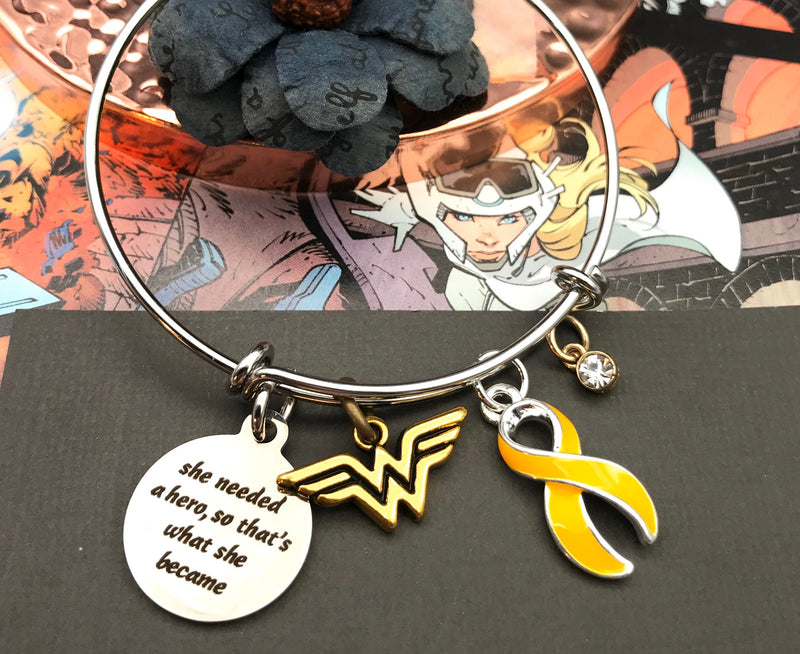 Gold Ribbon Bracelet - She Needed a Hero, So That's What She Became - Rock Your Cause Jewelry