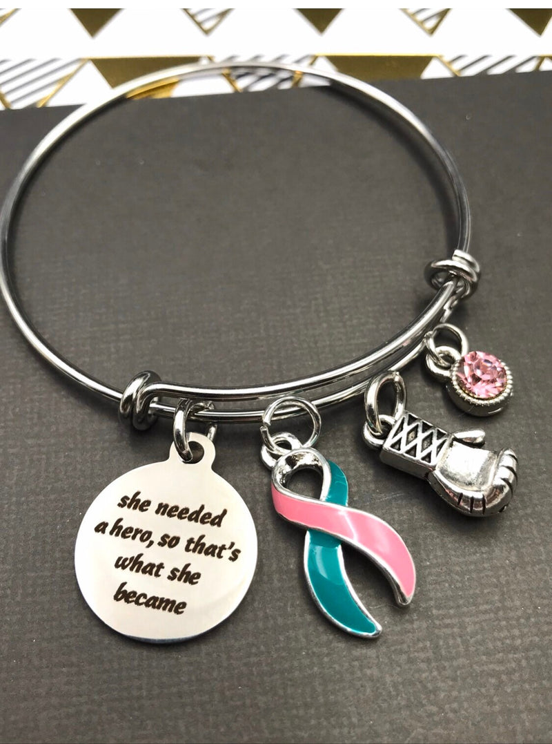 Pink & Teal (Previvor) Ribbon - She Needed a Hero, So That's What She Became - Rock Your Cause Jewelry