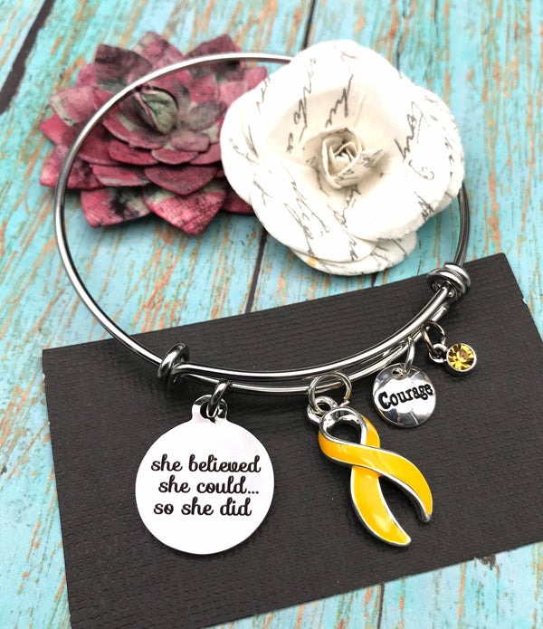 Gold Ribbon Charm Bracelet - She Believed She Could, So She Did - Rock Your Cause Jewelry