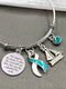 Teal & White Ribbon Charm Bracelet - She Stood In The Storm / Adjusted Her Sales - Rock Your Cause Jewelry