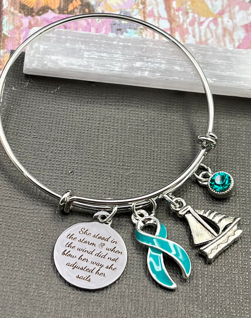 Teal Ribbon Charm Bracelet - Se Stood in the Strom / She Adjusted Her Sails - Rock Your Cause Jewelry